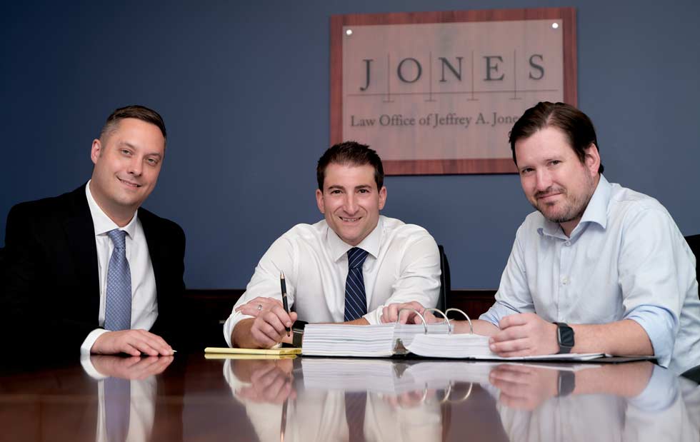 Photo of attorneys Justin M. Schmidt, Christopher J. Vilione and Michael K. Johnson
