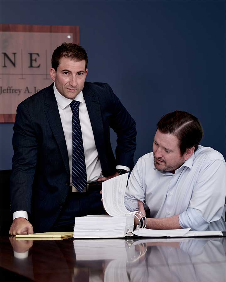 Christopher J. Vilione in his conference room with a client